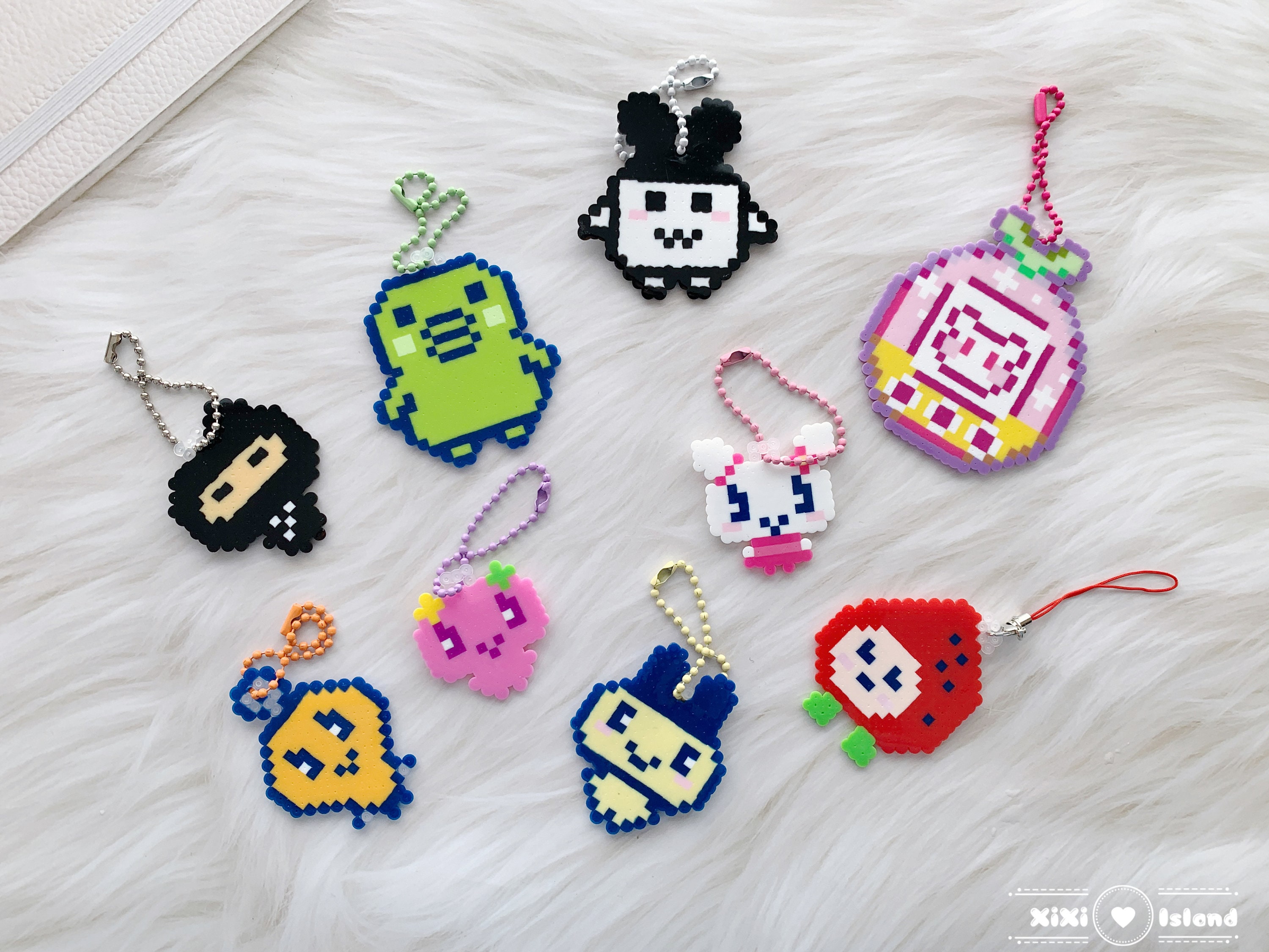 i made a few tamas out of perler beeds (guess whos my fav :)) : r/tamagotchi