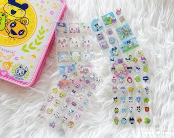 Set van 4 Tamagotchi-stickers | Leuke sprankelende transparante sticker | Kawaii-decoratiestickers