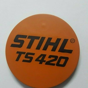 May include: Orange round sticker with black text that reads "STIHL TS 420" with a registered trademark symbol.