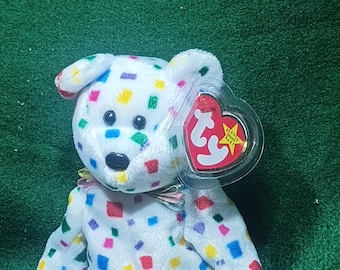 TY 2K MINT Rare Ty " TY 2K " was Born With Errors in 2000 which makes this Vintage Retired Confetti Bear Unique being highly sought after..