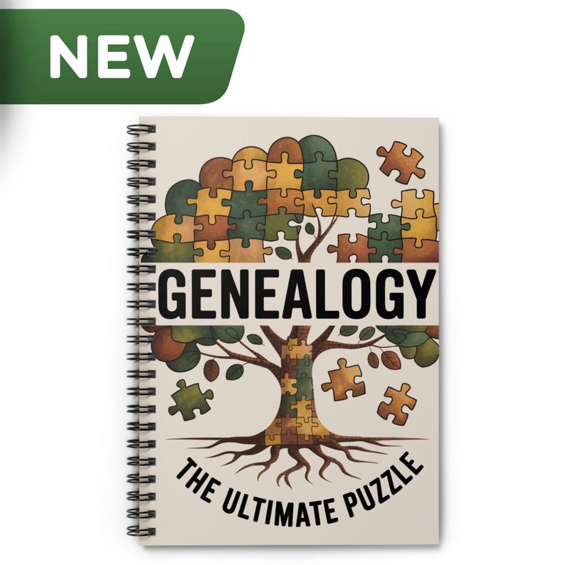 May include: Spiral-bound notebook with a tree design made of puzzle pieces. The word "GENEALOGY" is centered above the tree, with "THE ULTIMATE PUZZLE" below. A green banner with "NEW" is in the upper left corner.