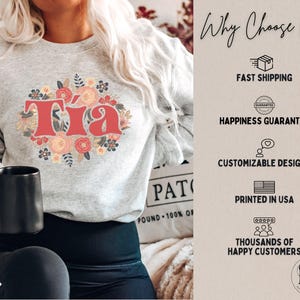 May include: A light gray sweatshirt with the word "Tia" in red, surrounded by a floral wreath. The sweatshirt is part of a clothing collection. The image also includes text that says "Why Choose Us" and lists benefits like fast shipping and customizable designs.