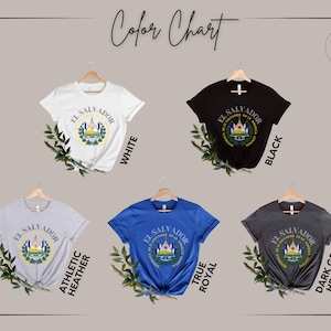 May include: Five short-sleeve t-shirts in white, black, athletic heather, true royal, and dark grey heather. Each shirt features a circular graphic of the El Salvador coat of arms with the text El Salvador and Republica De El Salvador En La America Central.