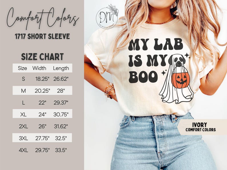 May include: An ivory short-sleeve t-shirt featuring the black text MY LAB IS MY BOO and a graphic of a dog wearing a ghost costume and holding an orange jack-o'-lantern. A size chart displays width and length measurements in inches for sizes S to 4XL.