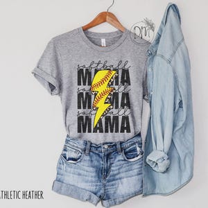 a t - shirt and jean shorts are hanging on a hanger