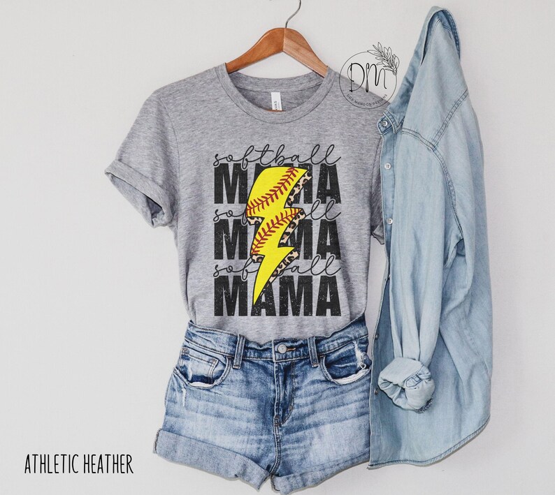 a t - shirt and jean shorts are hanging on a hanger