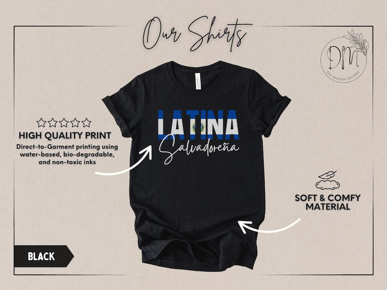 May include: A black short-sleeve t-shirt featuring the word LATINA in block letters filled with the blue and white El Salvador flag pattern, with the word Salvadore&ntilde;a written in white cursive script underneath the flag text.