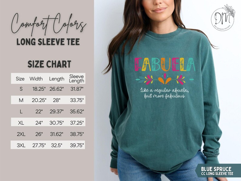 May include: Blue Spruce long sleeve tee with the word "ABUELA" in colorful letters. The shirt has the phrase "like a regular abuela, but more fabulous" below the word. A size chart is also visible.