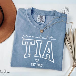 Comfort Colors Promoted to Tia Shirt Tia Established Shirt Tia Est Shirt New Tia Mothers Day Gift for Tia Pregnancy Reveal Shirt Nueva Tia