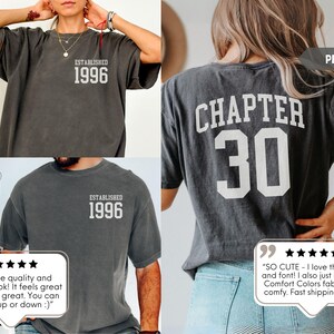 May include: Dark gray t-shirts with white text. One shirt says "ESTABLISHED 1996" and another says "CHAPTER 30". The shirts have a vintage look. The shirts are made of a soft, comfortable fabric.