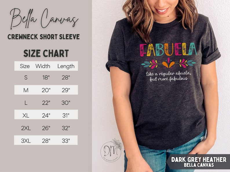 May include: Dark grey heather Bella Canvas crewneck short sleeve t-shirt. The shirt features the word "FABUELA" in colorful letters with floral accents. Below the word is the phrase "like a regular abuela, but more fabulous". The size chart shows the width and length in inches.