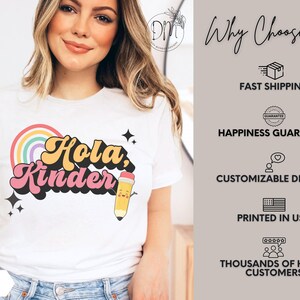 May include: A white t-shirt featuring a colorful graphic with a rainbow, black stars, and a cartoon pencil. The text reads "Hola, Kinder" in a retro font. To the right, a list includes "Why Choose Us," "Fast Shipping," "Happiness Guarantee," "Customizable Designs," "Printed in USA," and "Thousands of Happy Customers."