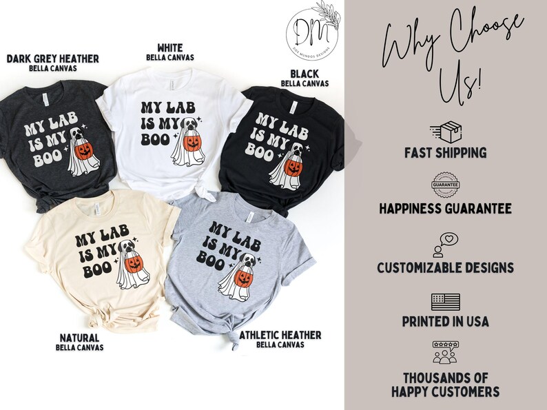 May include: Five short-sleeved t-shirts in dark grey heather, white, black, natural, and athletic heather. Each shirt features a graphic of a dog wearing a ghost costume and holding an orange pumpkin bucket with the text MY LAB IS MY BOO.