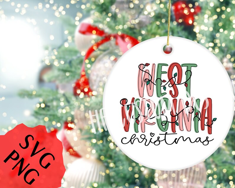 May include: White ceramic Christmas ornament with the text "West Virginia Christmas" in red, pink, and green lettering with a string of lights around the words.