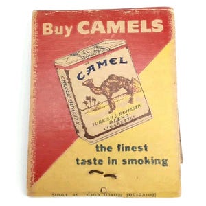 Anuncio de cigarrillos de la época de la guerra Caja de cerillas Camel El mejor gusto en tabaco Década de 1940