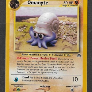 Pokemon Card - Omanyte - 50HP, Etapa 1 Pokemon issue, 60/75, muy buen estado usado, tarjeta genuina