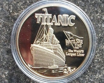 Titanic gold plated commemorative coin, in original coin capsule & plastic bag, bright shiny gold coin.