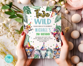 May include: A colorful invitation for a child's second birthday party. The invitation features a jungle theme with animals like a lion, elephant, zebra, and monkey wearing party hats. The text on the invitation reads "Two Wild" and "Michael's 2nd Birthday".