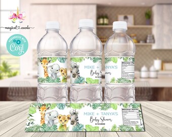 May include: Water bottle labels with a jungle theme featuring a giraffe, elephant, lion, and zebra. The labels are blue, green, and white with the text "Mike + Tanya's Baby Shower 6-12-2022".