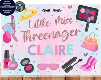 May include: A pink and blue watercolor background with the text "Little Miss Threenager CLAIRE" in pink, blue, and purple lettering. The background is decorated with images of makeup, a crown, a purse, and high heels.