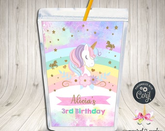 May include: A pink and purple juice box with a unicorn and rainbow design. The text "Alicia's 3rd Birthday" is on the front of the box.