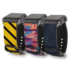 May include: Three Apple Watch bands with different geometric patterns. The bands are black with yellow and black stripes, pink and purple pixelated squares, and blue and black geometric shapes.