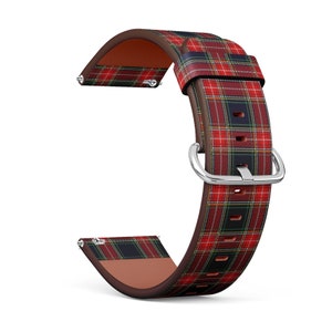 May include: Red and black tartan leather watch strap with a silver buckle.