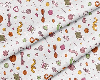 May include: A white fabric with a repeating pattern of sewing-themed illustrations. The pattern includes spools of thread, buttons, needles, yarn balls, and ribbons in various colors.