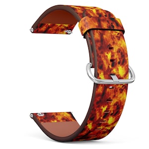 Peut inclure: Un bracelet de montre avec un motif de feu. Le bracelet est en cuir et possède une boucle argentée.