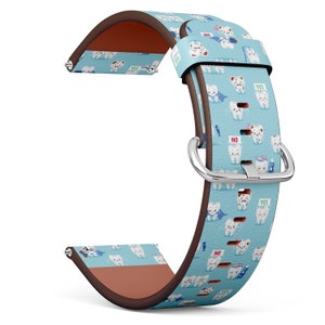 May include: A blue and brown leather watch band with a pattern of cartoon teeth. The band has the words "YES", "NO", and "YES" printed on it.