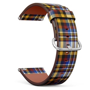 Könnte beinhalten: Ein braunes Lederarmband mit einem gelben, roten und blauen Karomuster. Das Armband hat eine silberne Schließe.