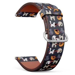 May include: A brown leather watch band with a black and white cat pattern. The band has a silver buckle.