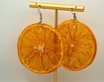 Echte Cara oranje oorbellen