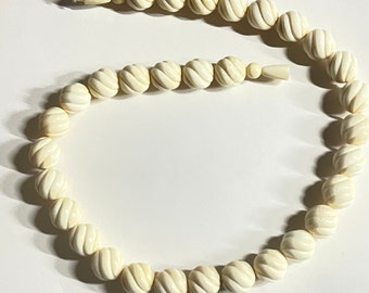 Vintage carved white coral 12 mm round beads with clasp 16" necklace circa 1970. Free shipping