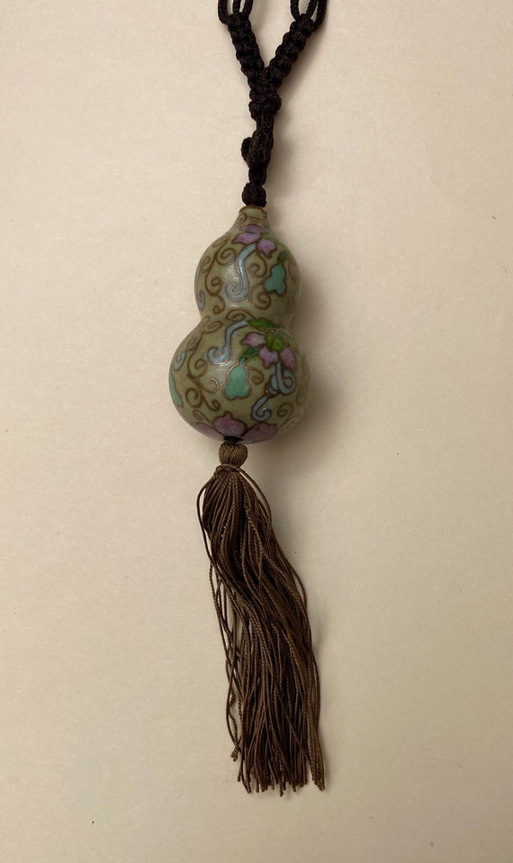 Cloisonne is an ancient metalwork technique to create… Gem