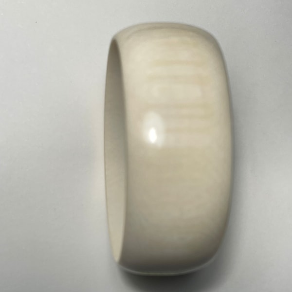 Vintage carved white coral bangle bracelet 28 mm wide oval shape. The diameter vary in size please request we will try to find one to fit.