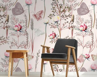 May include: A pink floral wallpaper with a gray armchair and a wooden side table. The wallpaper features a repeating pattern of pink flowers, green leaves, and butterflies.