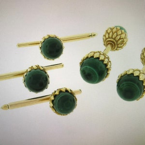 May include: Set of six gold cufflinks with green malachite stones.