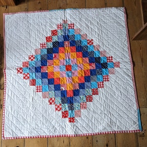 Patchwork quilt;vintage fabric;vintage quilt;handmade quilt;abstract quilt;baby quilt;diamond quilt;scrap quilt;squares quilt;mosaic quilt