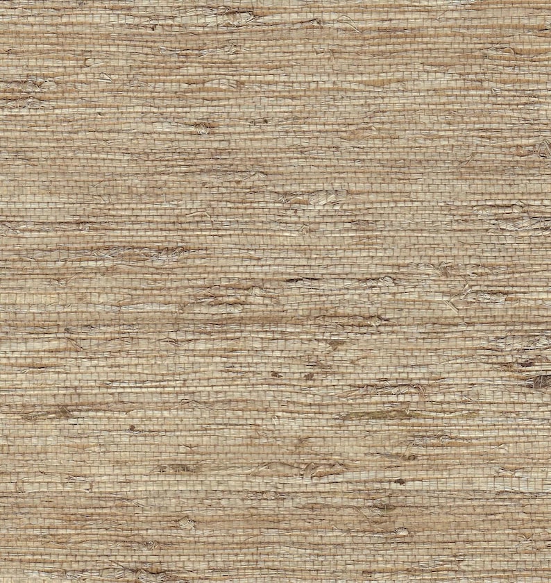 Puede incluir: Primer plano de una superficie tejida y texturizada. El material es de color beige natural con variaciones de tono, creando una apariencia r&uacute;stica y org&aacute;nica. El patr&oacute;n de tejido es horizontal, con fibras visibles y ligeras imperfecciones.