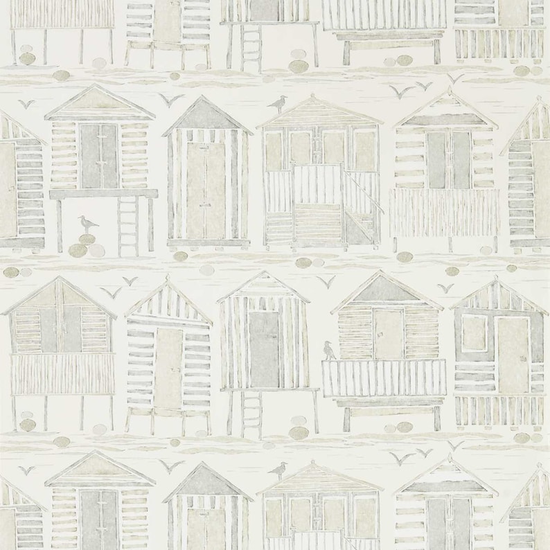 May include: A white background with a repeating pattern of gray and beige beach houses. The houses have different styles and some have ladders or balconies. The houses are on stilts and there are small gray birds and white seagulls flying around them.