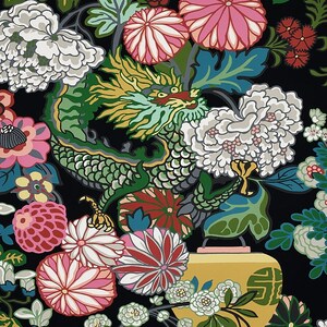May include: A green dragon with yellow and gold accents is surrounded by colorful flowers and leaves. The dragon is holding a yellow lantern with a gold symbol on it. The background is black.
