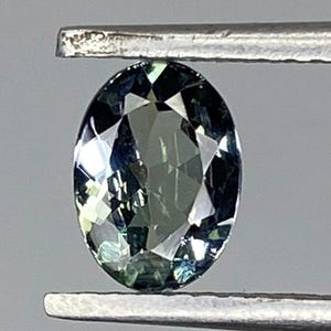 Natural Tanzanite loop clean Beutiful Colour  For Jewellery Making ,  0.80 Carat Weight, Size  7 × 5 × 2.90 MM