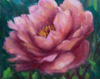 May include: Oil painting of a pink peony flower in full bloom. The petals are a soft pink with hints of yellow and orange in the centre. The background is a dark green with hints of blue and green foliage.