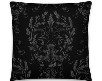 May include: Black throw pillow with a gray damask pattern.