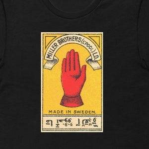Design de caixa de fósforos levantando a mão direita. Camiseta unissex. FRETE GRÁTIS