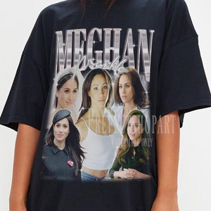 May include: Black oversized t-shirt with a graphic print of Meghan Markle in different outfits. The text "MEGHAN Markle" is printed in silver letters on the shirt.