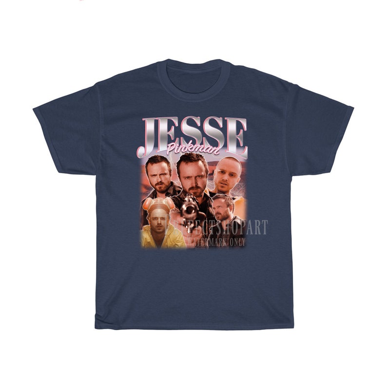 May include: Navy blue t-shirt with a vintage-style graphic of Jesse Pinkman from the TV show Breaking Bad. The graphic features multiple images of Jesse Pinkman in different poses.