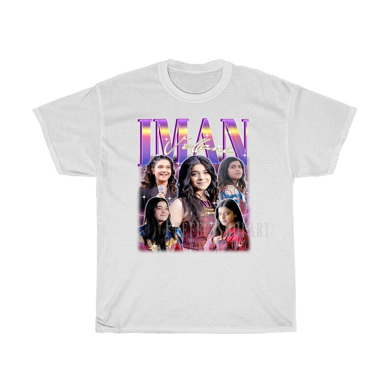 May include: White t-shirt with a retro-style graphic featuring a group of young women with the text "IMAN" in a purple and pink gradient.