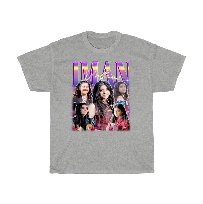 May include: A gray t-shirt with a retro-style graphic featuring a group of girls with the text "IMAN VIBES" in purple and pink.